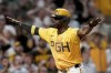 Pittsburgh Pirates' Andrew McCutchen reacts after scoring during the sixth inning of a baseball game against the Arizona Diamondbacks, Friday, Aug. 2, 2024, in Pittsburgh. (AP Photo/Matt Freed)