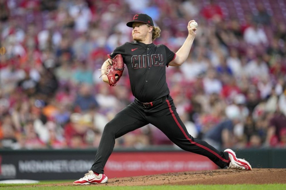 Cincinnati Reds pitcher Andrew Abbott throws during the second inning of a baseball game against the San Francisco Giants, Friday, Aug. 2, 2024, in Cincinnati. (AP Photo/Jeff Dean)