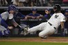 New York Yankees' Gleyber Torres, right, is tagged out at home plate by Toronto Blue Jays catcher Brian Serven, left, during the second inning of a baseball game, Friday, Aug. 2, 2024, in New York. (AP Photo/Pamela Smith)