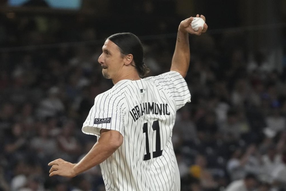 Retired professional soccer player Zlatan Ibrahimović throws the first pitch before a baseball game between the New York Yankees and the Toronto Blue Jays, Friday, Aug. 2, 2024, in New York. (AP Photo/Pamela Smith)