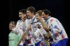 Czech Republic's fencers Jiri Beran, Jakub Jurka, Martin Rubes and Michal Cupr celebrate on the podium after winner the bronze medal in the men's team epee competition during the 2024 Summer Olympics at the Grand Palais, Friday, Aug. 2, 2024, in Paris, France. (AP Photo/Andrew Medichini)