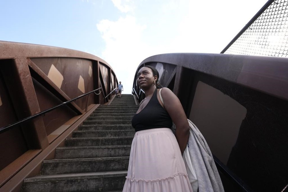 Lauren Bell stands for a portrait at Crescent Park in New Orleans, Wednesday, May 1, 2024. In December 2023, Bell posted a TikTok video in response to someone asking if they can self-diagnose their IBS with this advice: “I’m always going to recommend you see a medical professional.” (AP Photo/Gerald Herbert)