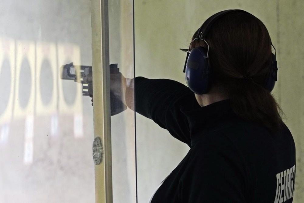 Georgia's Nino Salukvadze competes in the 25m pistol rapid women's qualification round at the 2024 Summer Olympics, Friday, Aug. 2, 2024, in Chateauroux, France. (AP Photo/Manish Swarup)