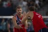 Norway's Christian Sandlie Soerum, left, and Anders Berntsen Mol react during the men's pool B beach volleyball match between Norway and Netherlands at Eiffel Tower Stadium at the 2024 Summer Olympics, Friday, Aug. 2, 2024, in Paris, France. (AP Photo/Louise Delmotte)
