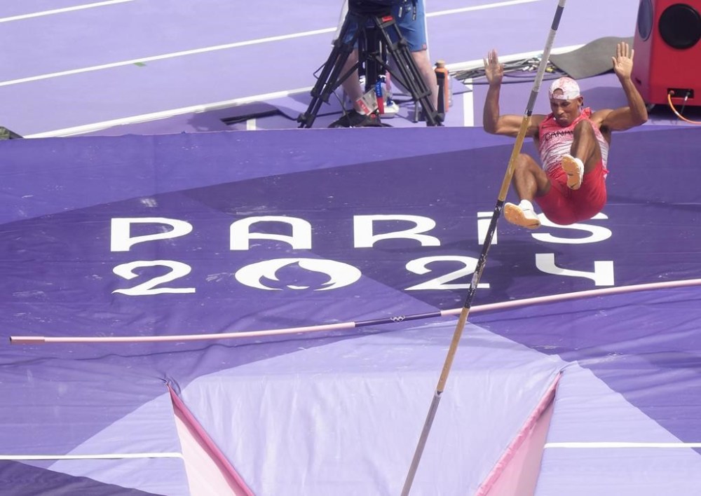 Canada's Damian Warner knocks the bar down as he competes in the men's pole vault in Decathlon at the 2024 Paris Summer Olympics in Paris, France on Saturday, August 3, 2024. THE CANADIAN PRESS/Nathan Denette