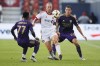 Toronto FC forward Federico Bernardeschi (centre) manoeuvres the ball around Orlando City SC forward Ivan Angulo (77) and defender Kyle Smith (24) during the first half of their MLS soccer match in Toronto, Wednesday, July 3, 2024. THE CANADIAN PRESS/Cole Burston