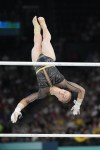 Elsabeth Black, of Canada, performs on the uneven bars during the women's artistic gymnastics all-around finals in Bercy Arena at the 2024 Summer Olympics, in Paris, France, Thursday, Aug. 1, 2024. THE CANADIAN PRESS/AP-Natacha Pisarenko
