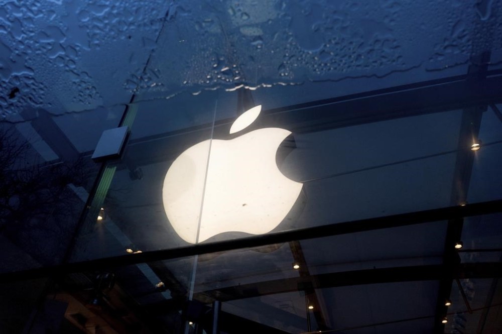 An Apple logo hangs at a Palo Alto, Calif., Apple store on Friday, Feb. 2, 2024. (AP Photo/Noah Berger)