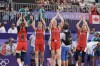 Canada's Kacie Bosch (4), Katherine Plouffe (2), Paige Crozon (7) and Michelle Plouffe (1) celebrate after a women's 3x3 basketball pool round match against against Azerbaijan during the 2024 Summer Olympics, Saturday, Aug. 3, 2024, in Paris, France. Canada won 21-19. THE CANADIAN PRESS/AP-Frank Franklin II