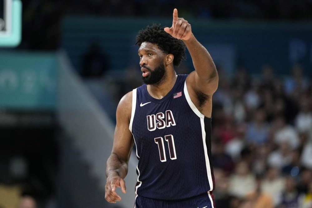 United States' Joel Embiid gestures after scoring during a men's basketball game against Puerto Rico at the 2024 Summer Olympics, Saturday, Aug. 3, 2024, in Villeneuve-d'Ascq, France. (AP Photo/Michael Conroy)