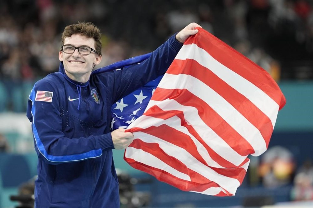 Stephen Nedoroscik, of the United States, celebrates after winning the bronze medal during the men's artistic gymnastics individual pommel finals at Bercy Arena at the 2024 Summer Olympics, Saturday, Aug. 3, 2024, in Paris, France. (AP Photo/Abbie Parr)