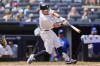 New York Yankees' Anthony Volpe hits a two-run home run on a fly ball to left center field during the fifth inning of a baseball game against the Toronto Blue Jays, Saturday, Aug. 3, 2024, in New York. (AP Photo/Julia Nikhinson)