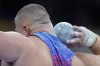 Joe Kovacs, of the United States, competes in the men's shot put final at the 2024 Summer Olympics, Saturday, Aug. 3, 2024, in Saint-Denis, France. (AP Photo/Matthias Schrader)