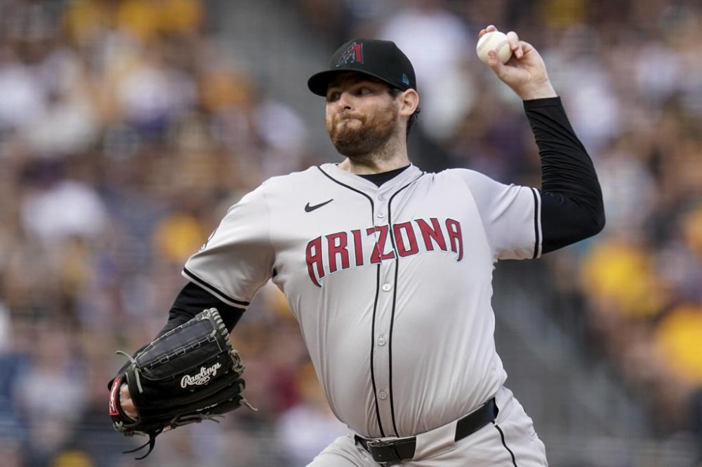 Arizona Diamondbacks starting pitcher Jordan Montgomery delivers during the first inning of a baseball game against the Pittsburgh Pirates, Saturday, Aug. 3, 2024, in Pittsburgh. (AP Photo/Matt Freed)