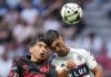Tijuana's Kevin Castaneda, left, and Vancouver Whitecaps' Mathias Laborda collide while vying for the ball during the first half of a Leagues Cup soccer match, in Vancouver, on Saturday, Aug. 3, 2024. THE CANADIAN PRESS/Darryl Dyck