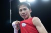 Taiwan's Lin Yu-ting celebrates after defeating Bulgaria's Svetlana Staneva in their women's 57 kg quarterfinal boxing match at the 2024 Summer Olympics, Sunday, Aug. 4, 2024, in Paris, France. (AP Photo/Ariana Cubillos)