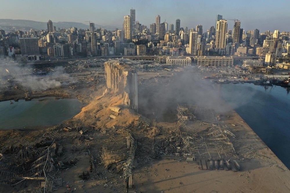 FILE - This drone picture shows the destruction after an explosion at the seaport of Beirut, Lebanon, Aug. 5, 2020. (AP Photo/Hussein Malla, File)