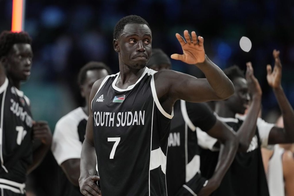 South Sudan's Bul Kuol walks off the court after being defeated by Serbia in a men's basketball game at the 2024 Summer Olympics, Saturday, Aug. 3, 2024, in Villeneuve-d'Ascq, France. (AP Photo/Michael Conroy)