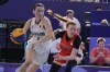 Germany's Elisa Mevius (8) drives past Canada's Kacie Bosch (4) in the women's 3x3 basketball pool round match during the 2024 Summer Olympics, Thursday, Aug. 1, 2024, in Paris, France. THE CANADIAN PRESS/AP/Frank Franklin II