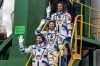 FILE - In this photo released by Roscosmos space corporation, NASA astronaut Tracy Dyson, centre, Oleg Novitsky of Roscosmos, bottom, and Marina Vasilevskaya of Belarus wave as they board to the space ship at the Russian leased Baikonur cosmodrome, Kazakhstan, Thursday, March 21, 2024. (Roscosmos space corporation via AP, File)