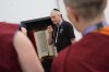 Rabbi Moshe Lewin shows the Torah to buddhist monks in the inter-religious hall at the Olympic Village at the 2024 Summer Olympics, Tuesday, July 23, 2024, in Paris, France. (AP Photo/Rebecca Blackwell)
