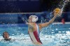 France's Ema Vernoux scores a goal during a women's water polo Group B preliminary match between France and Italy at the 2024 Summer Olympics, Monday, July 29, 2024, in Saint-Denis, France. (AP Photo/Luca Bruno)