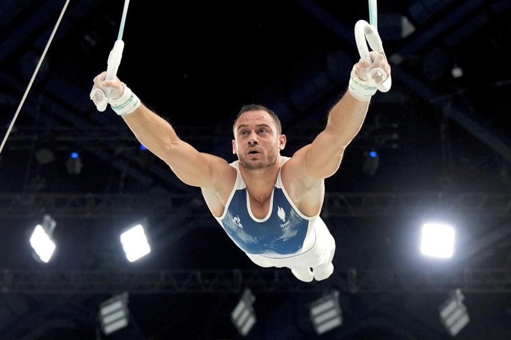 Samir Ait Said, of France, competes during the men's artistic gymnastics individual rings finals at Bercy Arena at the 2024 Summer Olympics, Sunday, Aug. 4, 2024, in Paris, France. (AP Photo/Charlie Riedel)