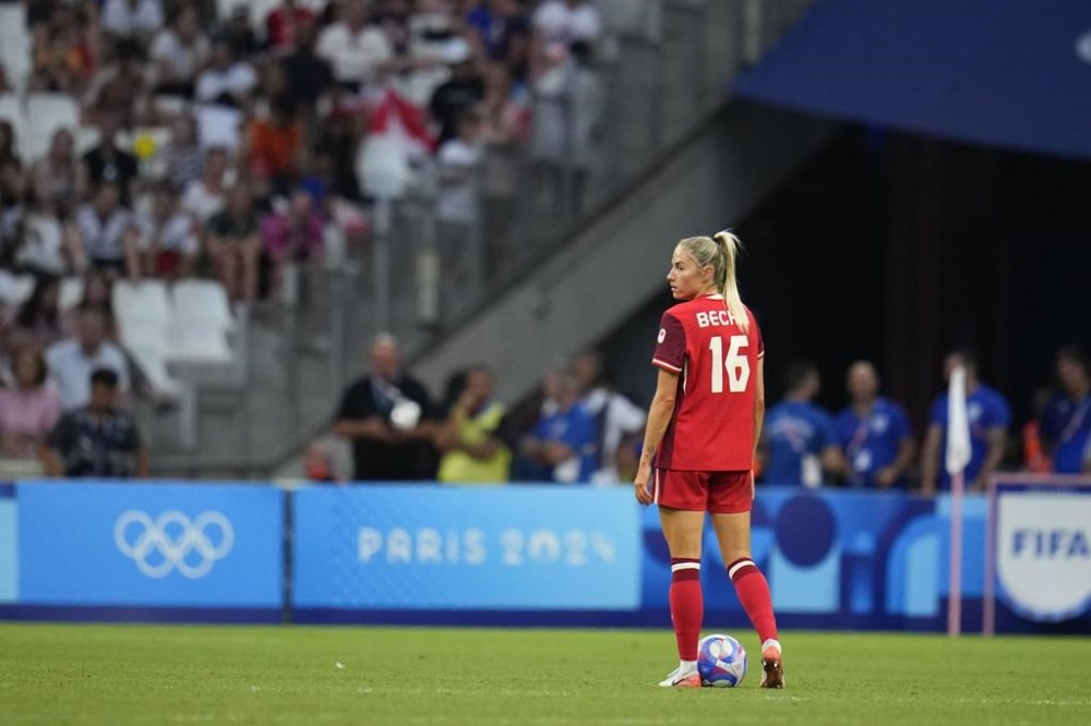 Canada's Janine Beckie participates in a women's quarterfinal soccer match between Canada and Germany at the 2024 Summer Olympics, Saturday, Aug. 3, 2024, at Marseille Stadium in Marseille, France. THE CANADIAN PRESS/AP/Julio Cortez