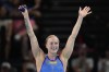 Sweden's Sarah Sjoestroem celebrates after winning the gold medal in the women's 50-meter freestyle final at the Summer Olympics in Nanterre, France, Sunday, Aug. 4, 2024. (AP Photo/Brynn Anderson)