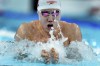 China's Qin Haiyang competes in a men's 4x100-meter medley relay heat at the Summer Olympics in Nanterre, France, Saturday, Aug. 3, 2024. (AP Photo/Natacha Pisarenko)