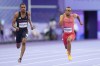Sprinter Andre De Grasse, of Markham, Ont., right, competes in the men’s 100m semi-finals at the 2024 Summer Olympics, Sunday, Aug. 4, 2024, in Saint-Denis, France. THE CANADIAN PRESS/Nathan Denette