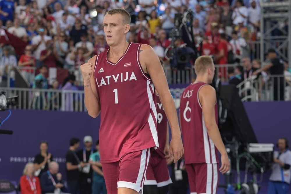 Latvia's Nauris Miezis gestures after a men's 3x3 basketball pool round match against Poland during the 2024 Summer Olympics, Sunday, Aug. 4, 2024, in Paris, France. Latvia won 22-16. (AP Photo/Frank Franklin II)