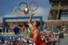 Czechia's David Schweiner serves in a beach volleyball match against Netherlands at the 2024 Summer Olympics, Sunday, Aug. 4, 2024, in Paris, France. (AP Photo/Robert F. Bukaty)