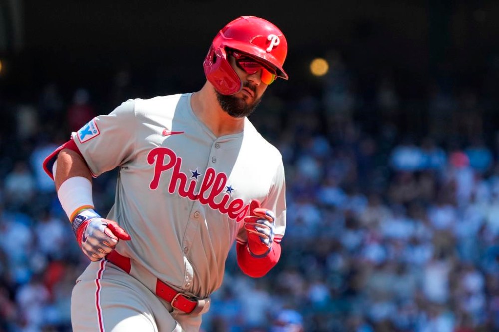 Philadelphia Phillies' Jeff Hoffman runs the bases after hitting a home run off of a pitch from Seattle Mariners pitcher Logan Gilbert during the first inning of a baseball game, Sunday, Aug. 4, 2024, in Seattle. (AP Photo/Liv Lyons)