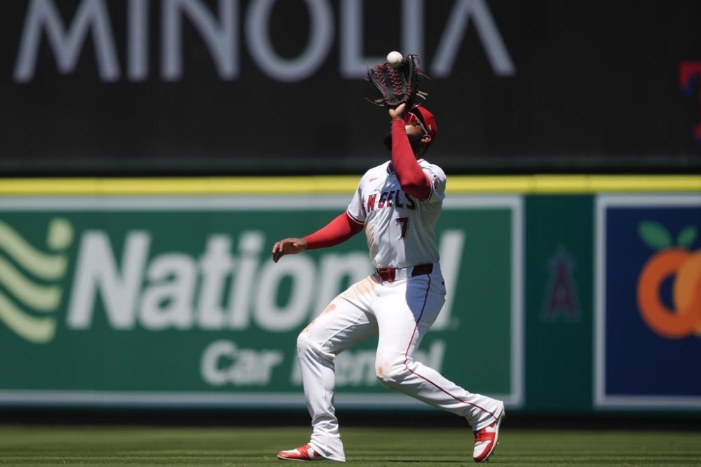 Los Angeles Angels right fielder Jo Adell catches a flyout by New York Mets' Jesse Winker during the fourth inning of a baseball game, Sunday, Aug. 4, 2024, in Anaheim, Calif. (AP Photo/Ryan Sun)