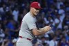 St. Louis Cardinals relief pitcher John King reacts after Chicago Cubs' Mike Tauchman hit a solo home run during the sixth inning of a baseball game in Chicago, Sunday, Aug. 4, 2024. (AP Photo/Nam Y. Huh)