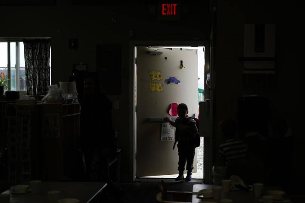 A child arrives in the Northern Lights Classroom at the Meadow Lakes CCS Early Learning, a Head Start center, Wednesday, May 8, 2024, in Wasilla, Alaska. (AP Photo/Lindsey Wasson)