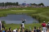 Rory McIlroy, of Ireland, plays off the 11 tee during the final round of the men's golf at the 2024 Summer Olympics, Sunday, Aug. 4, 2024, at Le Golf National in Saint-Quentin-en-Yvelines, France. (AP Photo/Matt York)