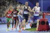 Jakob Ingebrigtsen, of Norway, and Josh Kerr, of Britain, run in a men's 1500 meters semifinal at the 2024 Summer Olympics, Sunday, Aug. 4, 2024, in Saint-Denis, France. (AP Photo/Ashley Landis)