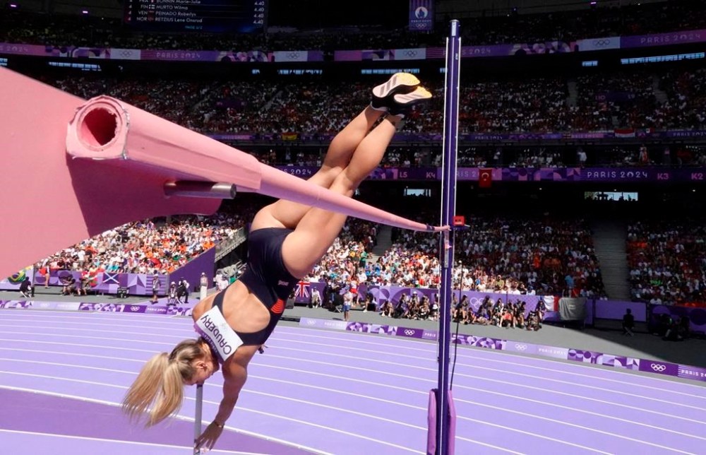 Molly Caudery of Britain competes in the women's pole vault qualification at the 2024 Summer Olympics, Monday, Aug. 5, 2024, in Saint-Denis, France. (Fabrizio Bensch/Pool Photo via AP)