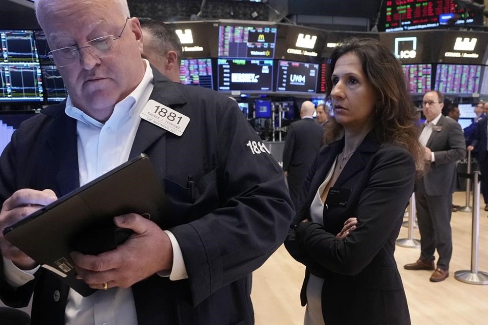 NYSE President Lynn Martin watches trading on the floor of the New York Stock Exchange, Monday, Aug. 5, 2024. Nearly everything on Wall Street is tumbling as fear about a slowing U.S. economy worsens and sets off another sell-off for financial markets around the world. (AP Photo/Richard Drew)