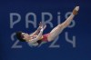 China's Quan Hongchan competes in the women's 10m platform diving semifinal at the 2024 Summer Olympics, Monday, Aug. 5, 2024, in Saint-Denis, France. (AP Photo/Lee Jin-man)