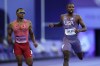 Noah Lyles, right, of the United States, leads Andre de Grasse, of Canada, to the finish line in their men's 200-meters' heat at the 2024 Summer Olympics, Monday, Aug. 5, 2024, in Saint-Denis, France. (AP Photo/Petr David Josek)
