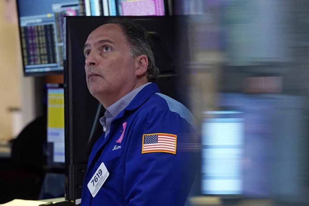 Trader James Conti on the floor of the New York Stock Exchange, Monday, Aug. 5, 2024. (AP Photo/Richard Drew)