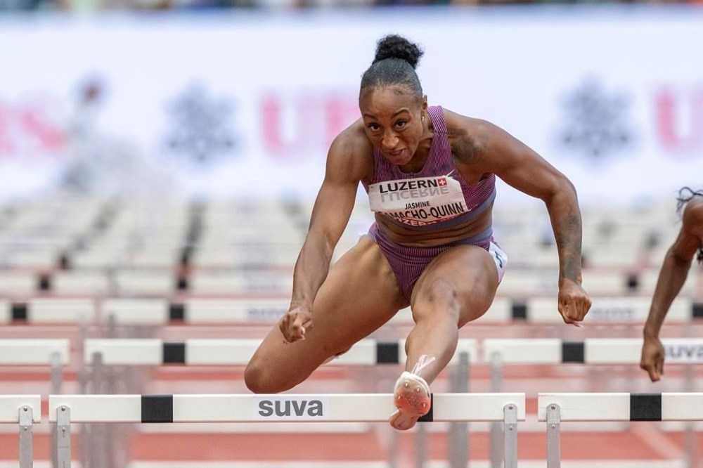Jasmine Camacho-Quinn from Puerto Rico during the Women 100m hurdles race at the International Athletics Meeting in Luzern, Switzerland, Tuesday, July 16, 2024. (Urs Flueeler/Keystone via AP)
