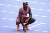 Aaron Brown, of Canada, waits for the results after finishing a men's 200 meters repechage heat at the 2024 Summer Olympics, Tuesday, Aug. 6, 2024, in Saint-Denis, France. THE CANADIAN PRESS/AP/Ashley Landis