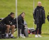 Katie Collar (right), head coach of the Vancouver Whitecaps FC League1 BC women’s team, is shown (standing) on the sidelines May 5, 2024, in a game against TSS Rovers at Thunderbird Stadium in Vancouver. THE CANADIAN PRESS/HO-Vancouver Whitecaps-Bob Frid **MANDATORY CREDIT**