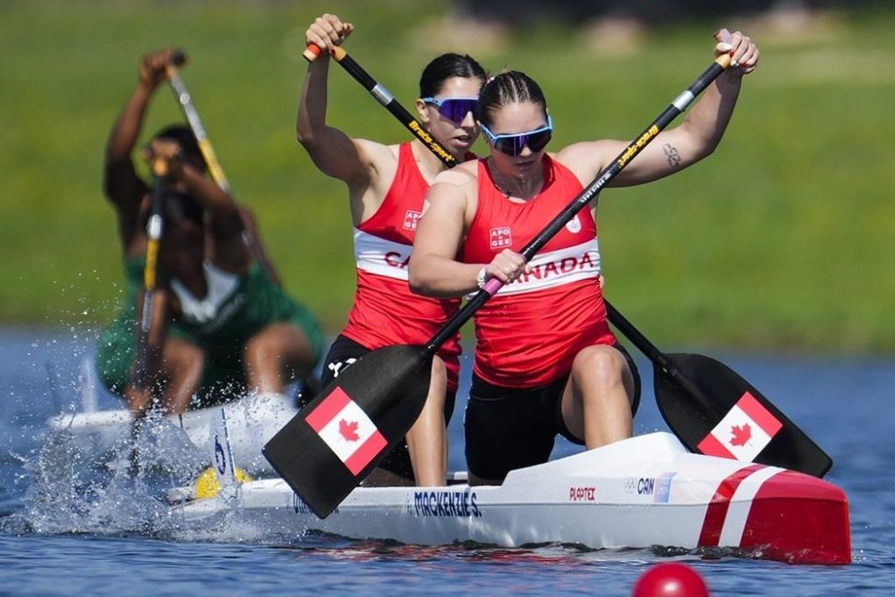 Canada's Sloan MacKenzie (front) and Katie Vincent compete in the women's canoe double 500-meter heats at the 2024 Summer Olympics, Tuesday, Aug. 6, 2024, in Vaires-sur-Marne, France. THE CANADIAN PRESS/AP/Ebrahim Noroozi