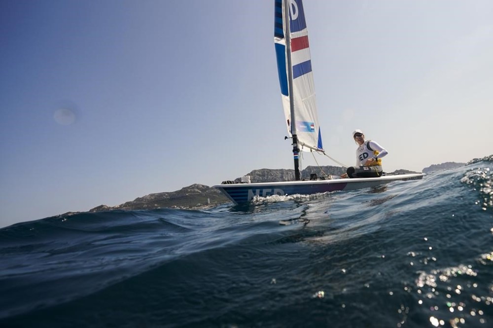 Marit Bouwmeester of the Netherlands sails back to the harbour after ILCA 6 dinghy class final race was postponed during the 2024 Summer Olympics, Tuesday, Aug. 6, 2024, in Marseille, France. (AP Photo/Jacquelyn Martin)
