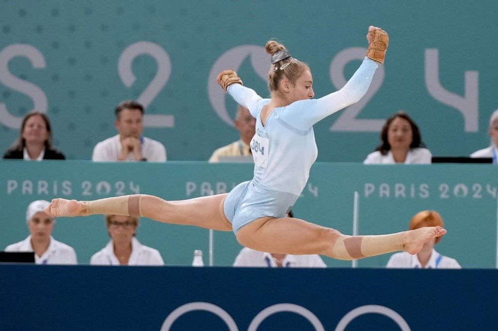 Sabrina Maneca-Voinea, of Romania, competes during the women's artistic gymnastics individual floor finals at Bercy Arena at the 2024 Summer Olympics, Monday, Aug. 5, 2024, in Paris, France. (AP Photo/Francisco Seco)